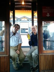 Richard Schave and Gordon Pattison scrub graffiti off Olivet